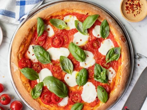 basil leaves on pizza