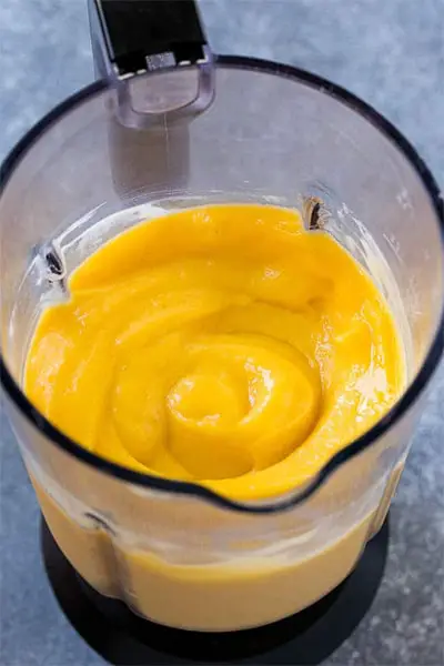 blending mango and lime juice