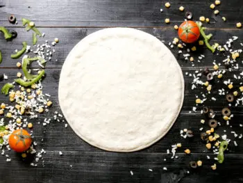 how to keep pizza dough from sticking to pan
