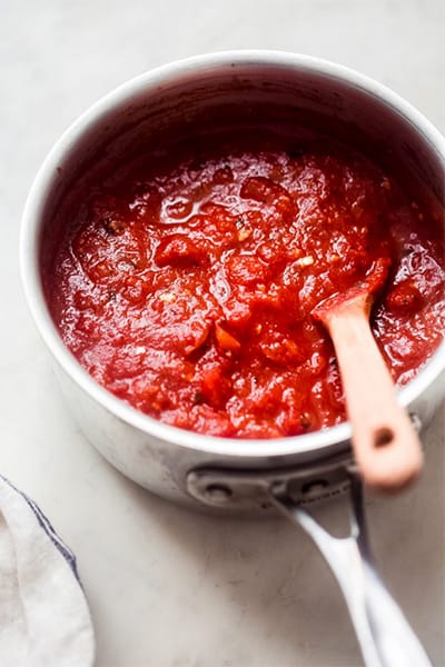 mixing ingredients of Costco pizza sauce