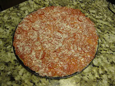 add oregano and romano cheese