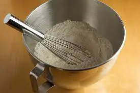 whisk together the flour and salt 