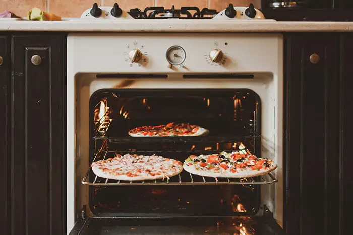 pizza on oven