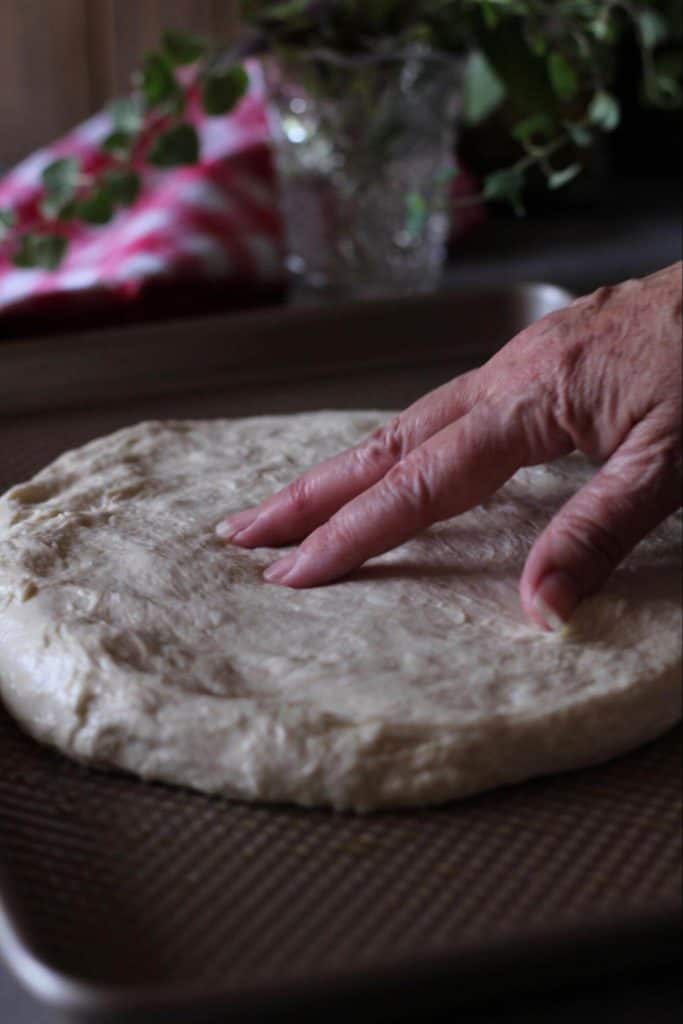 place dough on pizza pan