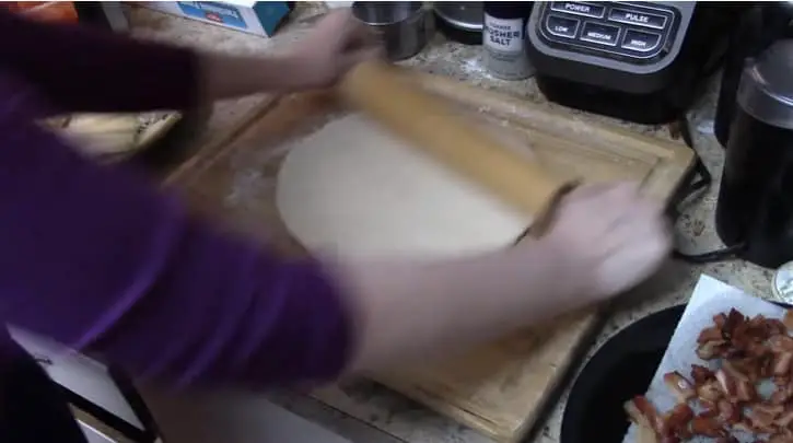roll dough with rolling pin