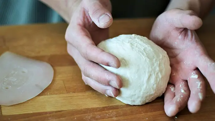 rolling the dough into ball