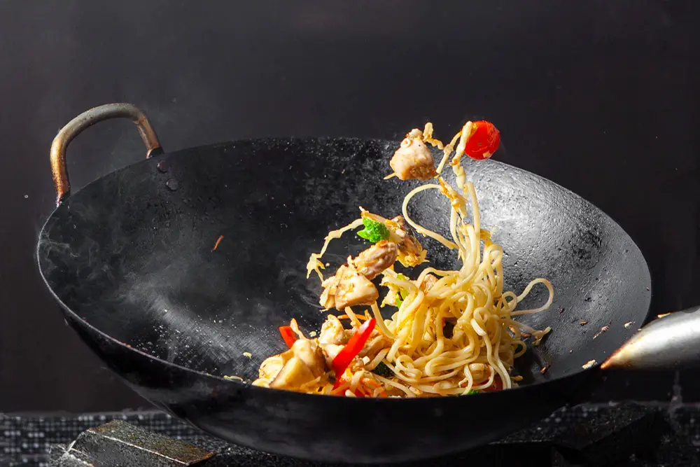 Carbon Steel vs Stainless Steel Wok Which Is Better for Cooking